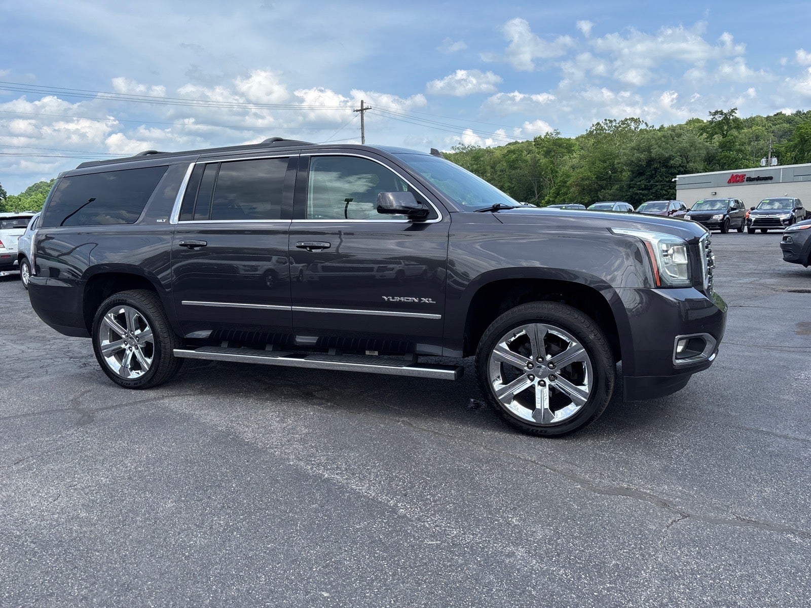 2018 GMC Yukon XL SLT in Iridium Metallic — front three-quarter view