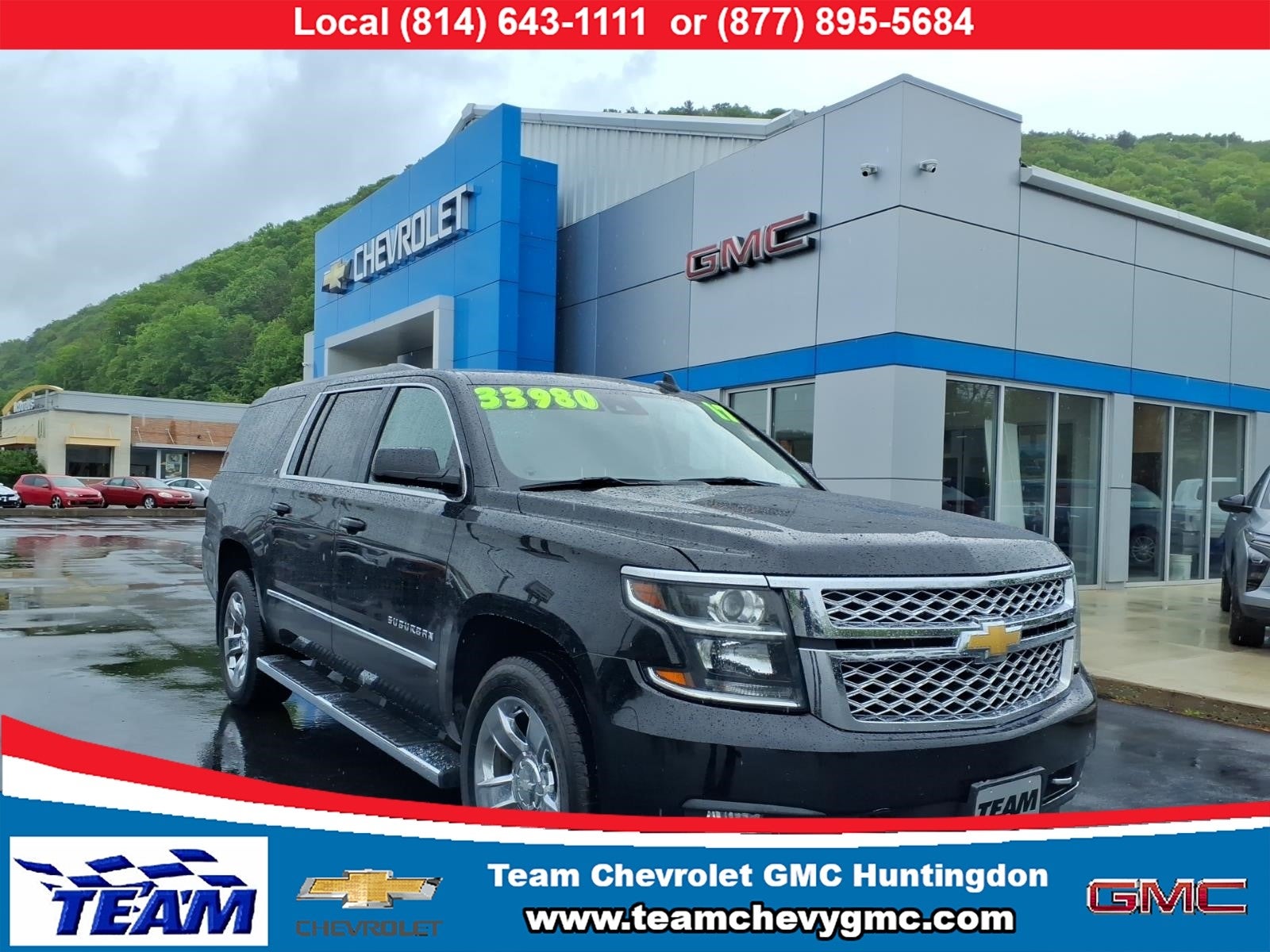 2017 Chevrolet Suburban LT in Black — front three-quarter view