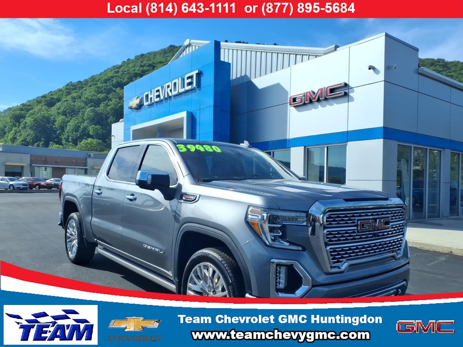 2019 GMC Sierra 1500 Denali in Satin Steel Metallic — front three-quarter view