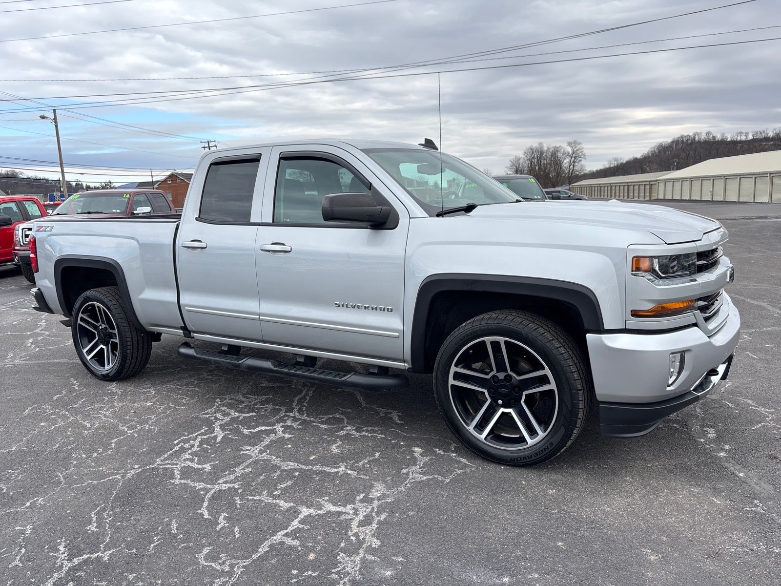 2018 Chevrolet Silverado 1500 LT in Silver Ice Metallic — front three-quarter view