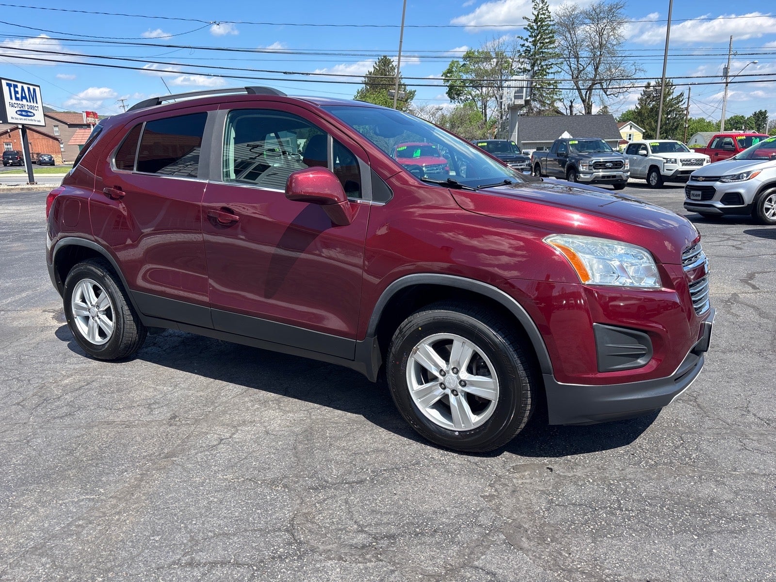 2016 Chevrolet Trax LT in Crimson Metallic — front three-quarter view
