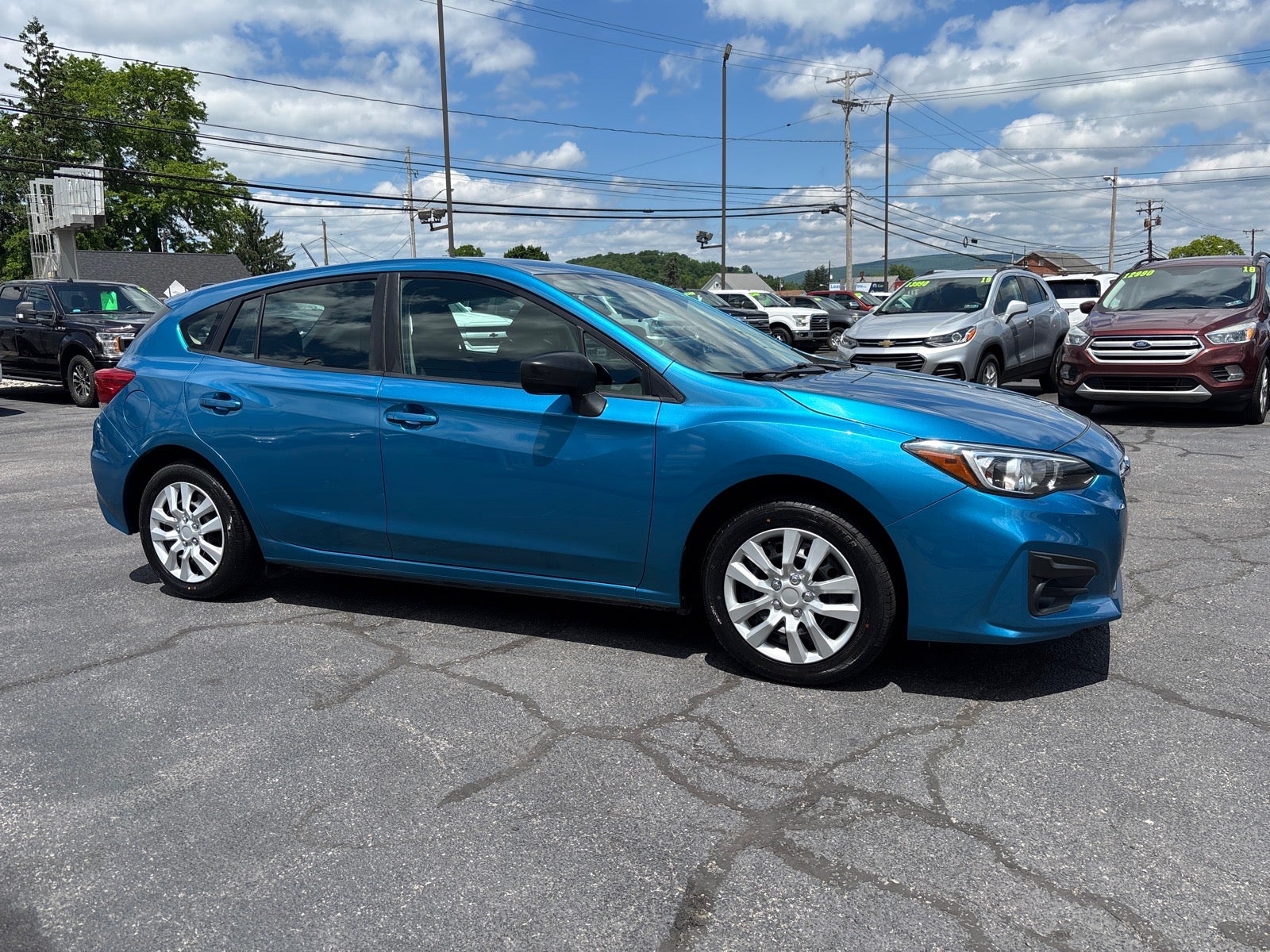 2018 Subaru Impreza 2.0i in Blue — front three-quarter view