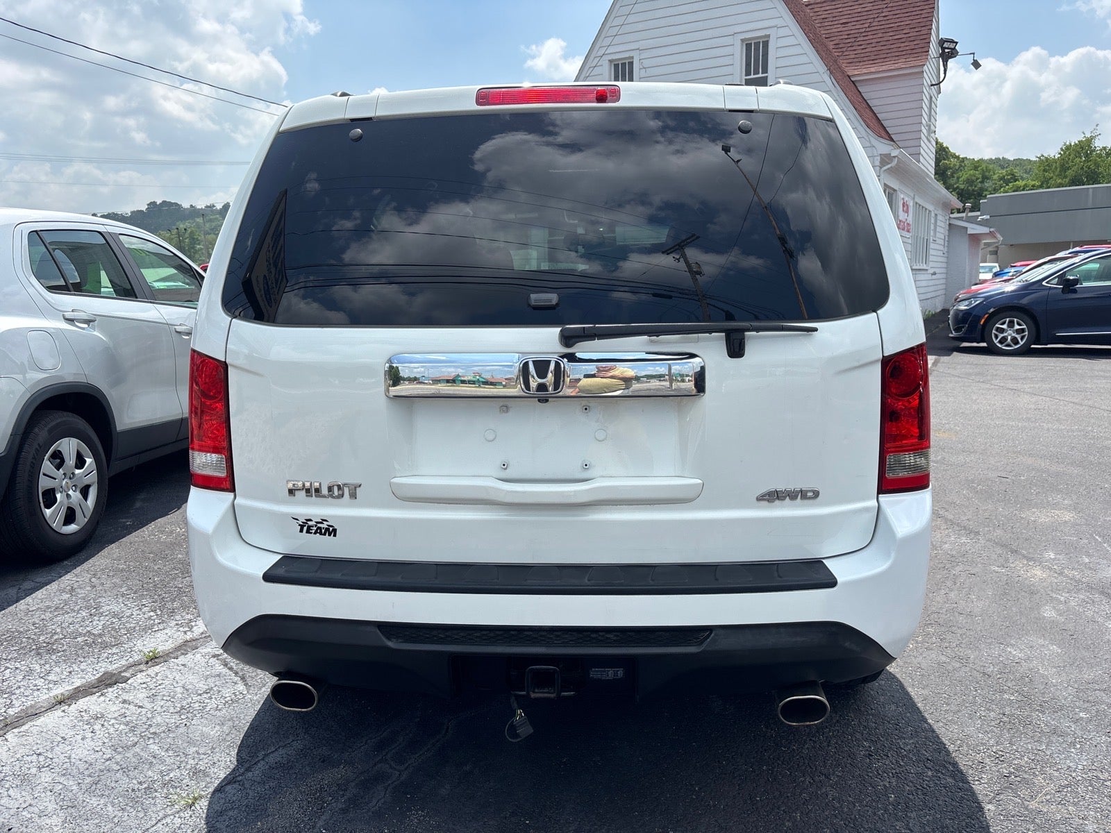 2014 Honda Pilot — rear three-quarter view