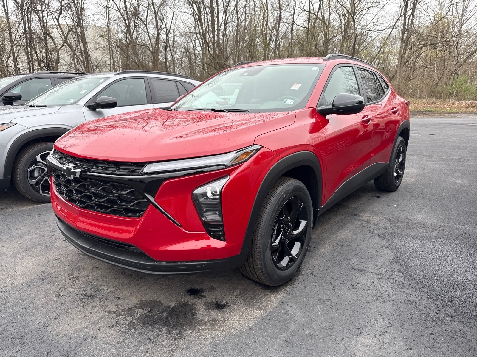 2026 Chevrolet Trax LT in Apex Red — front three-quarter view