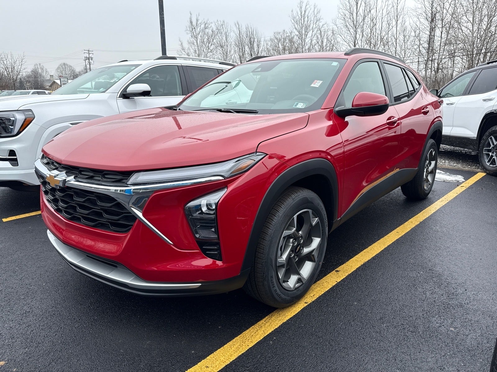 2026 Chevrolet Trax LT in Apex Red — front three-quarter view
