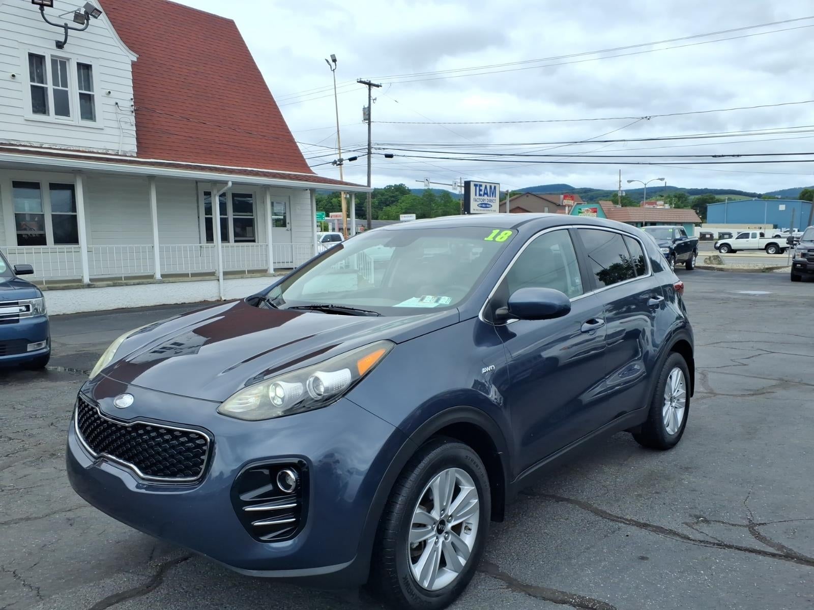 2018 Kia Sportage — rear three-quarter view